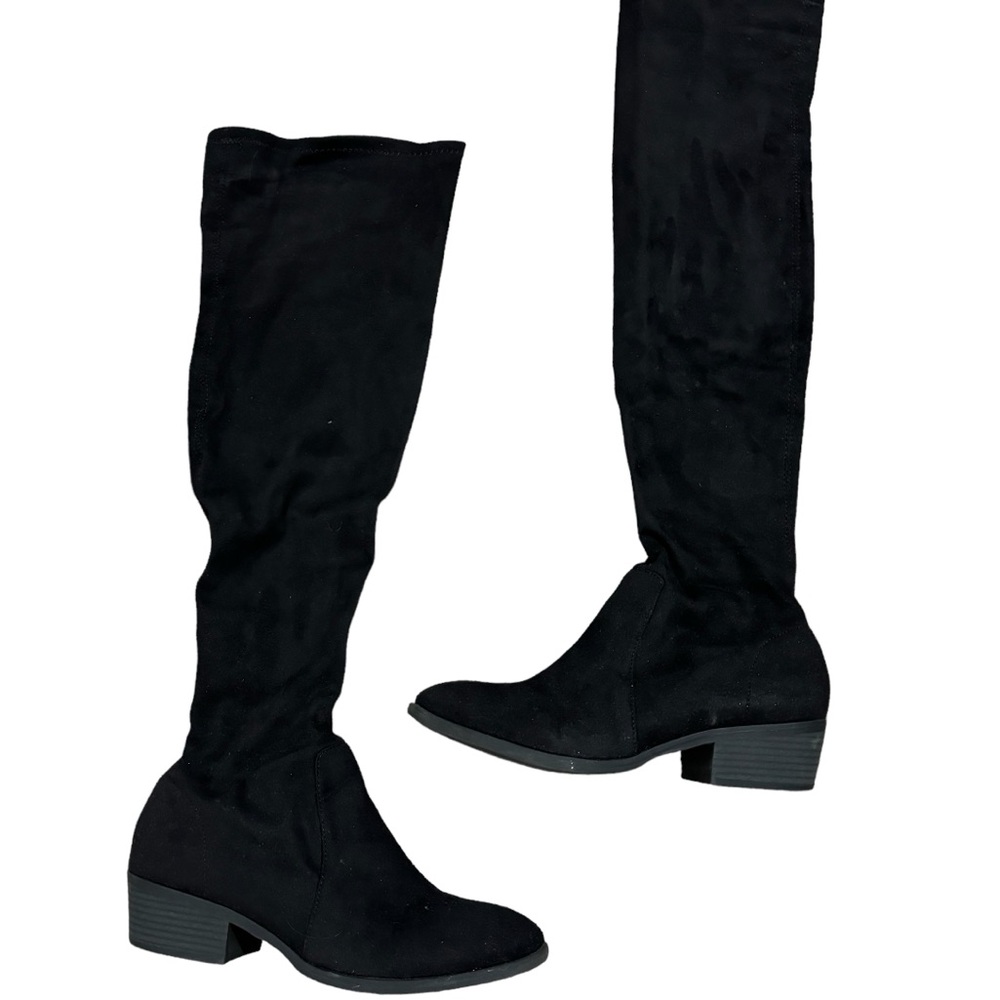Above the knee black suede boots in excellent condition.